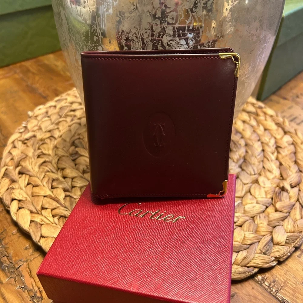 Cartier Deep Burgundy Leather bifold Gold Corner Hardware